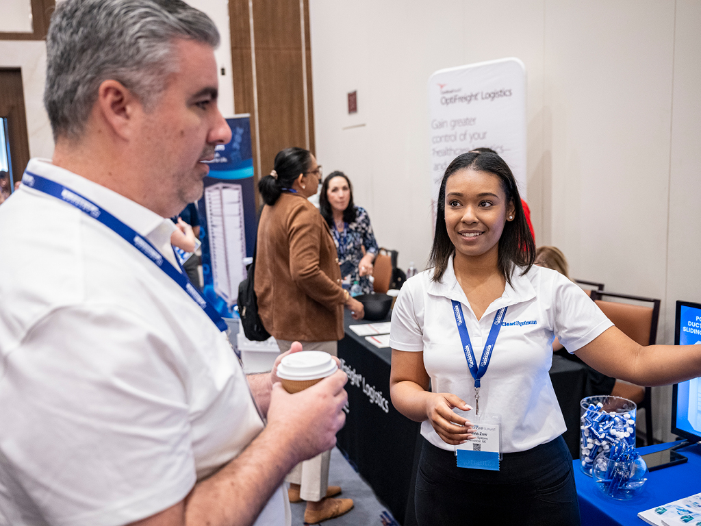 Leadership Summit exhibitors engaging with attendees in the exhibit hall