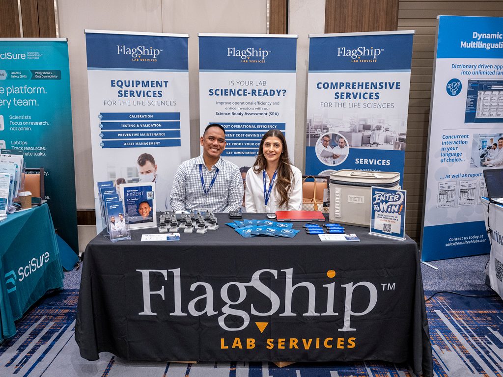Leadership Summit partners, Flagship, at their booth in the exhibit hall